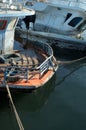 Broken sunken pleasure boat in the water,