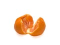 Broken tanderine in peel. Ripe Mandarin on a white background. Isolated