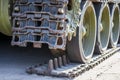 Broken tank caterpillar. Details of a military tank. Tank tracks Royalty Free Stock Photo