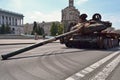 a broken tank of the russian army stands in the center of Kyiv