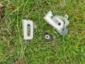 broken tape cassette in the grass flat view Royalty Free Stock Photo