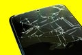 Broken tempered glass screen protector. Crashed smartphone. Close up