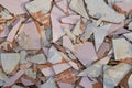 Broken tile fragments piled on the floor Royalty Free Stock Photo