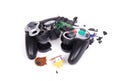Broken video game controller on white background Royalty Free Stock Photo