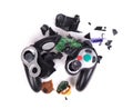 Broken video game controller on white background Royalty Free Stock Photo