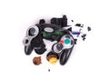 Broken video game controller on white background Royalty Free Stock Photo