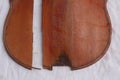 Broken violin parts for restoration