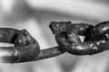 Broken and welded steel chain link, on white background Royalty Free Stock Photo