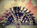 Broken wheel of an old abandoned water mill with vintage effect Royalty Free Stock Photo
