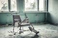 Broken wheelchair in abandoned medical sanitary unit number 126 in Pripyat
