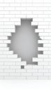 Broken white brick wall with a hole revealing a gray background with copy space Royalty Free Stock Photo