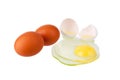 Broken white egg and two whole brown or red eggs on white background isolated close up Royalty Free Stock Photo