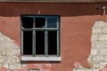 Broken window of an abandoned house. Background with copy space for text Royalty Free Stock Photo
