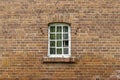 Broken window on brick wall Royalty Free Stock Photo