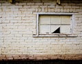 Broken window on derelict building