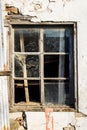 Broken window on old abandoned house. Close up Royalty Free Stock Photo