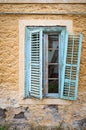 Broken window in an old abandoned house Royalty Free Stock Photo