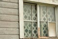 Broken Window and Panes on Old Abandoned Barn Royalty Free Stock Photo