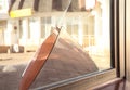 Broken window with sharp smithereens outdoors. Requiring repair Royalty Free Stock Photo