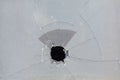 Broken window, ugly hole in glass Royalty Free Stock Photo