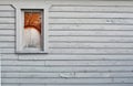 Broken window on wall with peeling paint Royalty Free Stock Photo