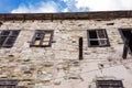 Broken Windows in an Abandoned House Royalty Free Stock Photo