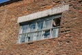 Broken Windows on a brick wall. close-up Royalty Free Stock Photo