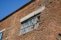 Broken Windows on a brick wall. close-up Royalty Free Stock Photo