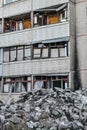 broken windows and collapsed apartments from a russian missile