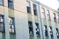 Broken windows in the factory, abandoned building Royalty Free Stock Photo