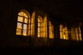 Broken windows of old ruined abandoned mansion at night Royalty Free Stock Photo