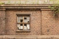 Broken windows in an old ruined factory Royalty Free Stock Photo