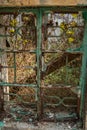 Broken windows at Yim Tin Tsai, an island in Sai Kung, Hong Kong, which is home to an abandoned fishing village. Royalty Free Stock Photo