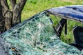 Broken windshield after a car accdent in the nature