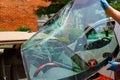 Broken windshield car special workers take of windshield of a car in auto service Royalty Free Stock Photo