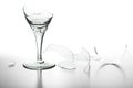 Broken wine glass and shattered glass isolated on white Royalty Free Stock Photo