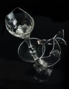 Broken wine glass and shattered glass isolated on black background Royalty Free Stock Photo