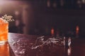 Broken wine glass on wooden bar counter. Royalty Free Stock Photo