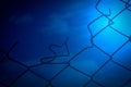 Broken Wire Fence and Blue Sky Background Royalty Free Stock Photo