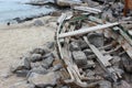 Broken wooden boat on the sea Royalty Free Stock Photo