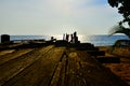 Broken wooden fisfing bridge during sunset at Khao Pilai in Phang Nga, southern of Thailand