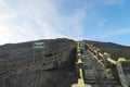 Tourists climbing the stairway leading to the rim of Mount Bromo Royalty Free Stock Photo