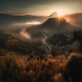 The Bromo mountains landscape during a heavy misty morning with a hint of golden hour is a stunning and atmospheric image that cap