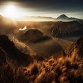 The Bromo mountains landscape during a heavy misty morning with a hint of golden hour is a stunning and atmospheric image that cap