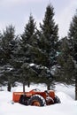 Tractor during snow storm in rural Bromont