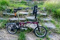 Brompton folding bike park on the rock step in the suburb of South Korea