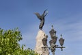 bronce angel sculpture of russalka monument with blue sky at background Royalty Free Stock Photo