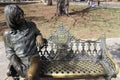 Bronse statue of John Lennon on a bench in a city park of Havana, Cuba Royalty Free Stock Photo