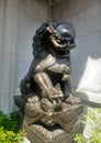 Bronz Chinese lion guarding Chinese shrine