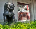 Bronz Chinese lion guarding Chinese shrine